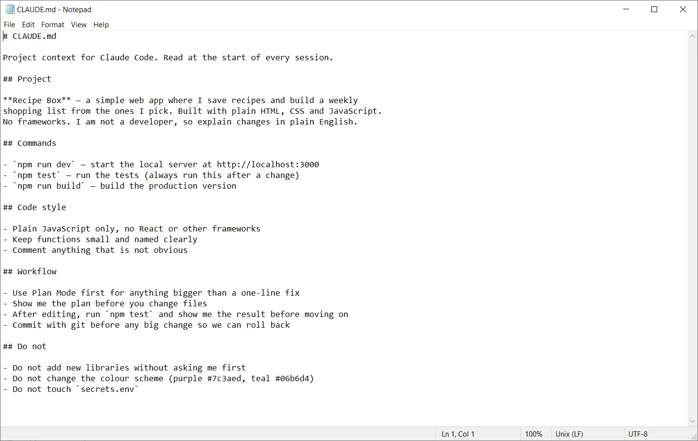 A short beginner-friendly CLAUDE.md file open in an editor, with project rules written in plain English